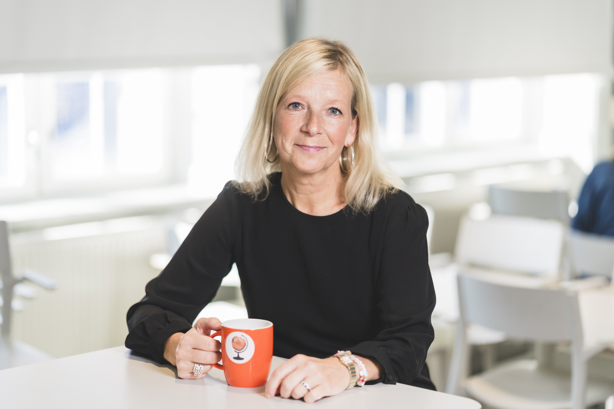Linda S. Jonsson, co-author of the Swedish study, sitting at a table with a cup.